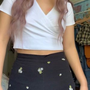 Urban Outfitters embroidered daisy kickflares
